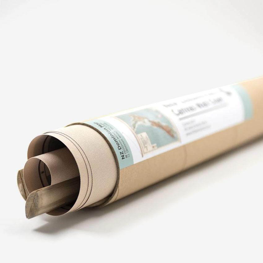 The 100 Percent NZ Map rolled in its packaging tube