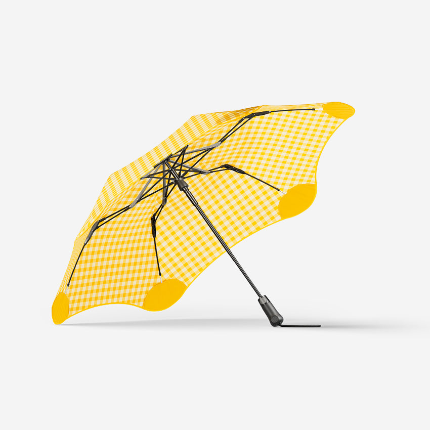 The Blunt Metro Umbrella in the Limited Edition Lemon and Honey print on a blank background