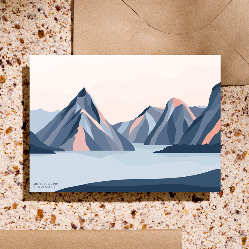 The Bridget Hall Milford Sound Gift Card on a terrazzo background with a envelope