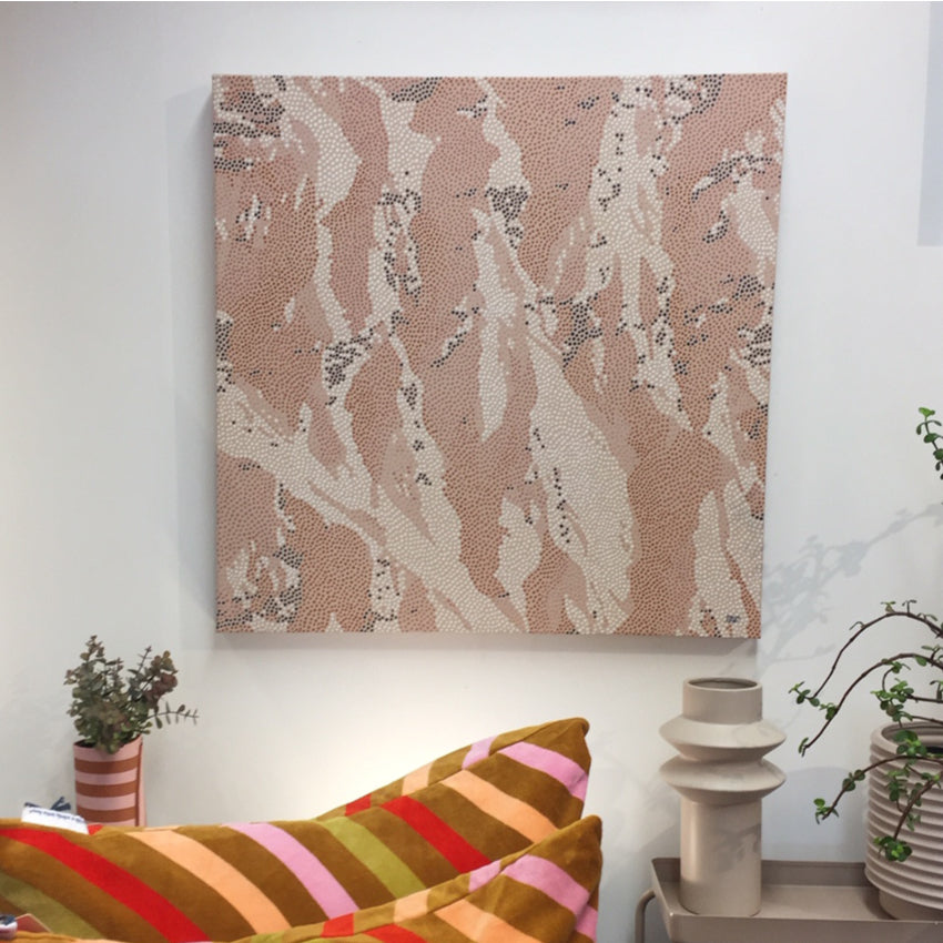 The Bridget Hall Design Original Black Peak Close Up Artwork hanging on a wall above cushions and vases