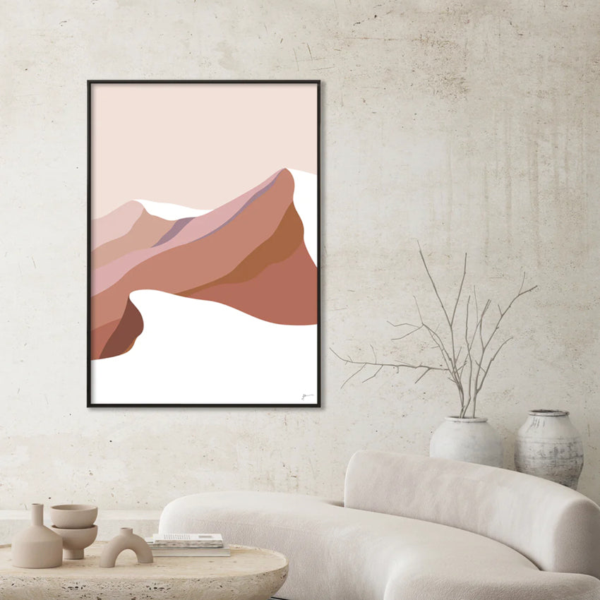 The Bridget Hall Modern Mountain Summit 3 Art Print in a black frame above a couch
