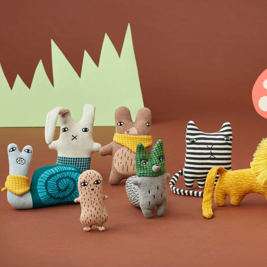 The Donna Wilson Wee Ones on a brown background