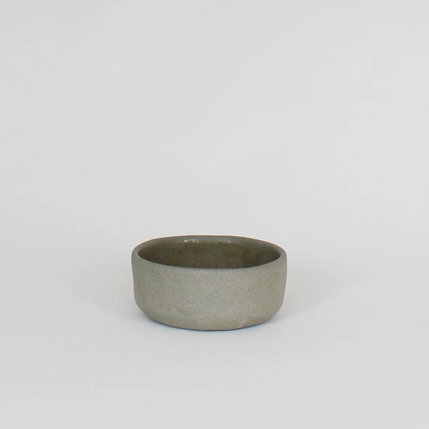 The JS Ceramic Ramekin in Sage Green on a blank background