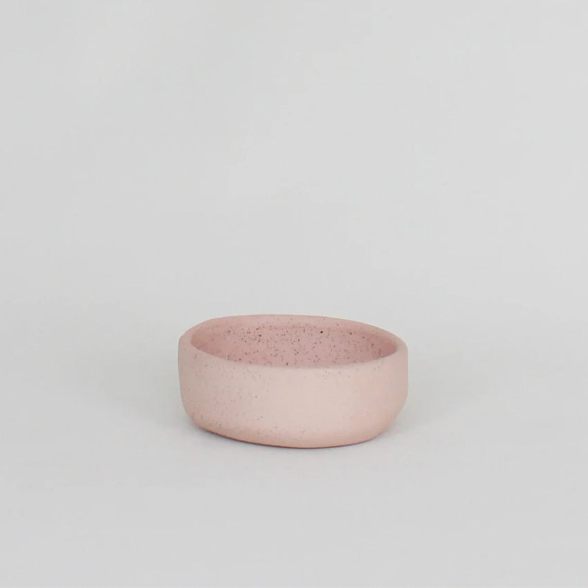 The JS Ceramic Ramekin in Pink Sand on a blank background