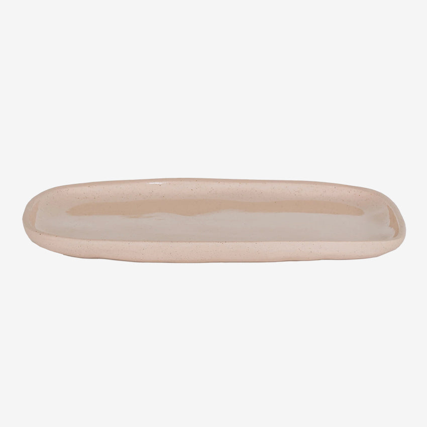The JS Ceramics Rectangle Platter in Pink Sand on a blank background