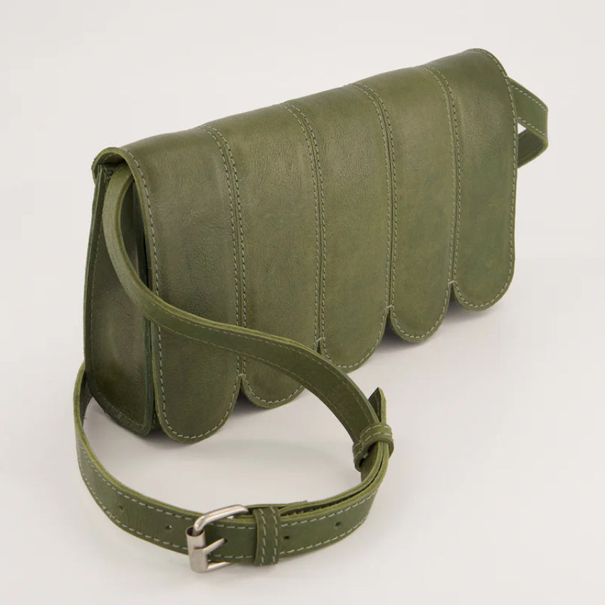 A side view of the Nancybird Curve Shoulder Bag