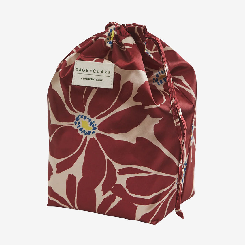 The bag for the Sage x Clare Acadia Cosmetic Case in Jade on a blank background