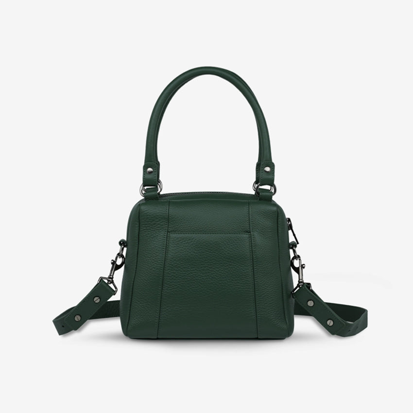 The back view of the Status Anxiety Mini Mountains Bag in Green in blank background
