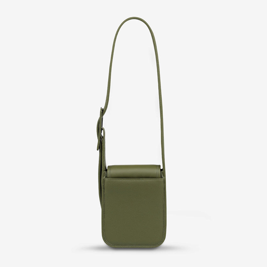 The back of the Status Anxiety Perplex Bag in Khaki on a blank background