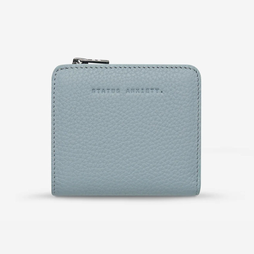 The Status Anxiety Sense Of Wonder Wallet in Powder Blue on a blank background