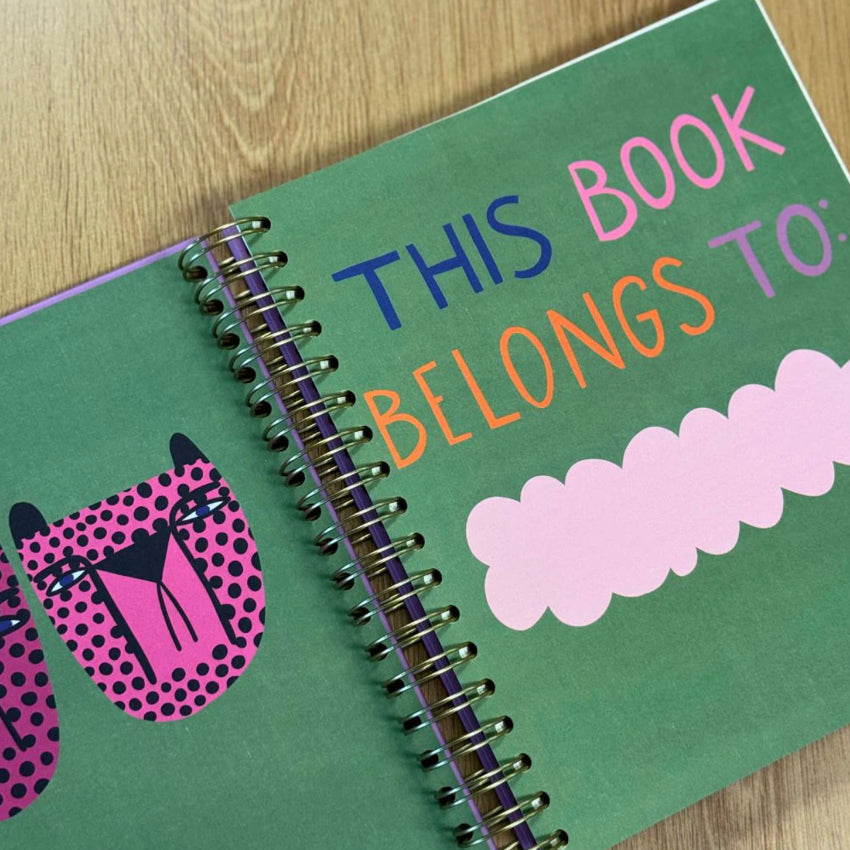 The Studio Soph Chunky Notebook opem on a wood table