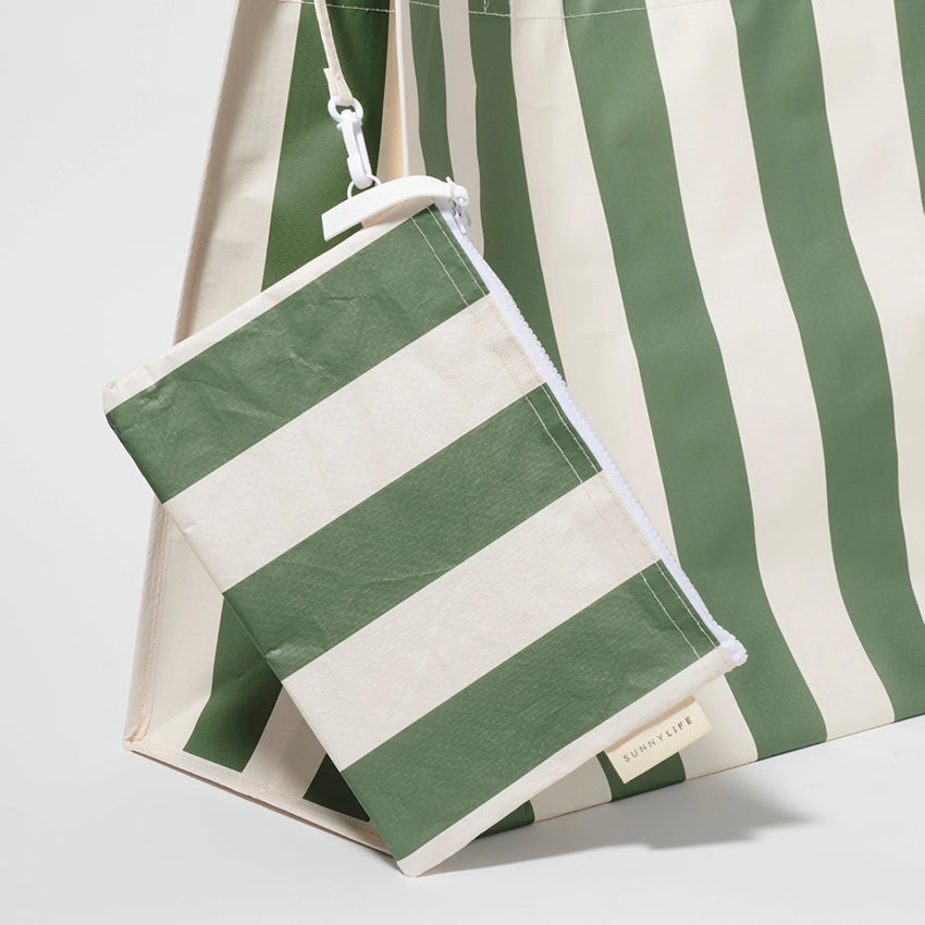 A closeup of the Sunnylife Carry All Beach Bag in Olive Stripe and its small pouch