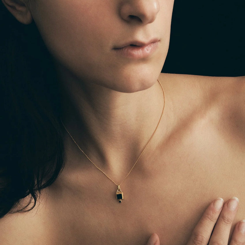 The Temple Of The Sun Adara Necklace in Gold on a model