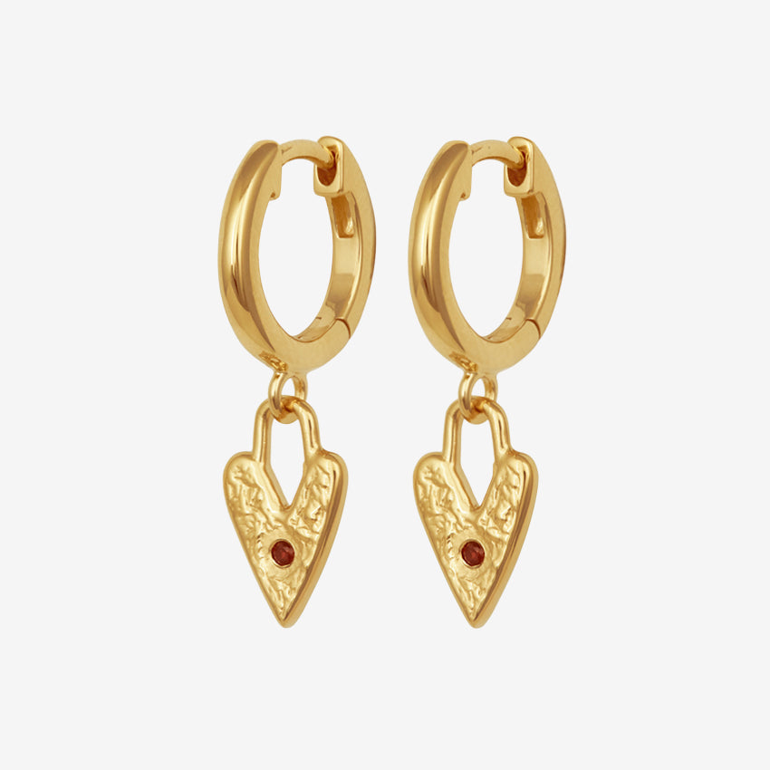 The Temple Of The Sun Lover Earrings in Gold on a blank background