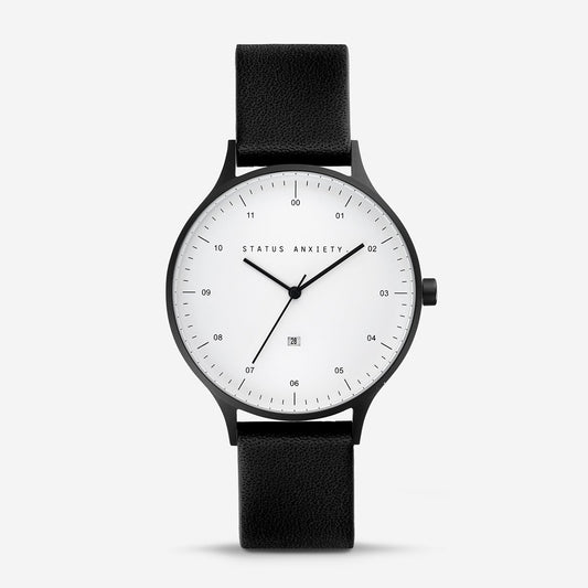 Status Anxiety Inertia Watch in Matte Black with White Face and Black Strap