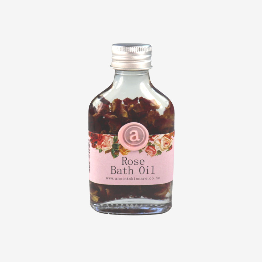 The Anoint Rose Bath Oil on a blank background