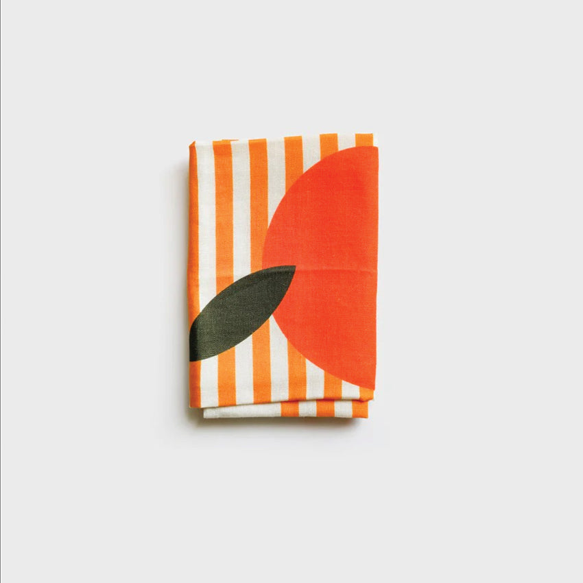 The Lettuce Large Striped Orange Tea Towel folded on a blank background