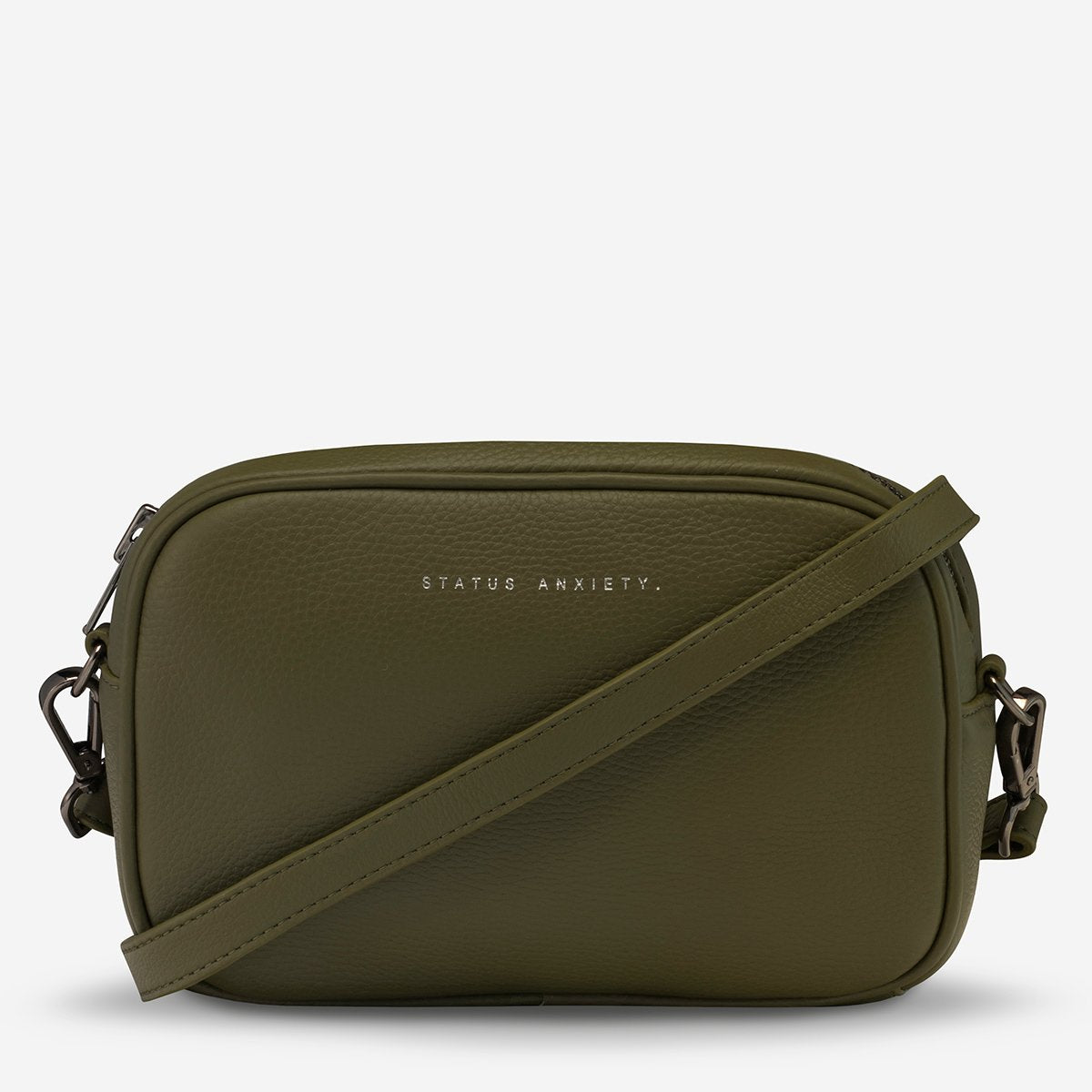 Status Anxiety Plunder Bag in Khaki with Strap Wrapped Around it