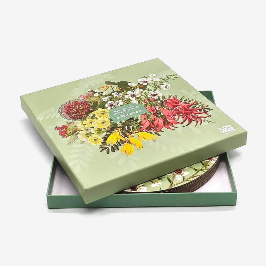 Green gift box of Placemats with NZ Native Botanical designs on a white background