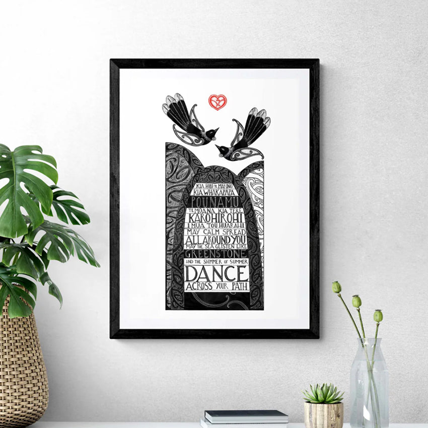 The Amber Smith Kia Horote Marino Art Print in a black frame hanging on a wall