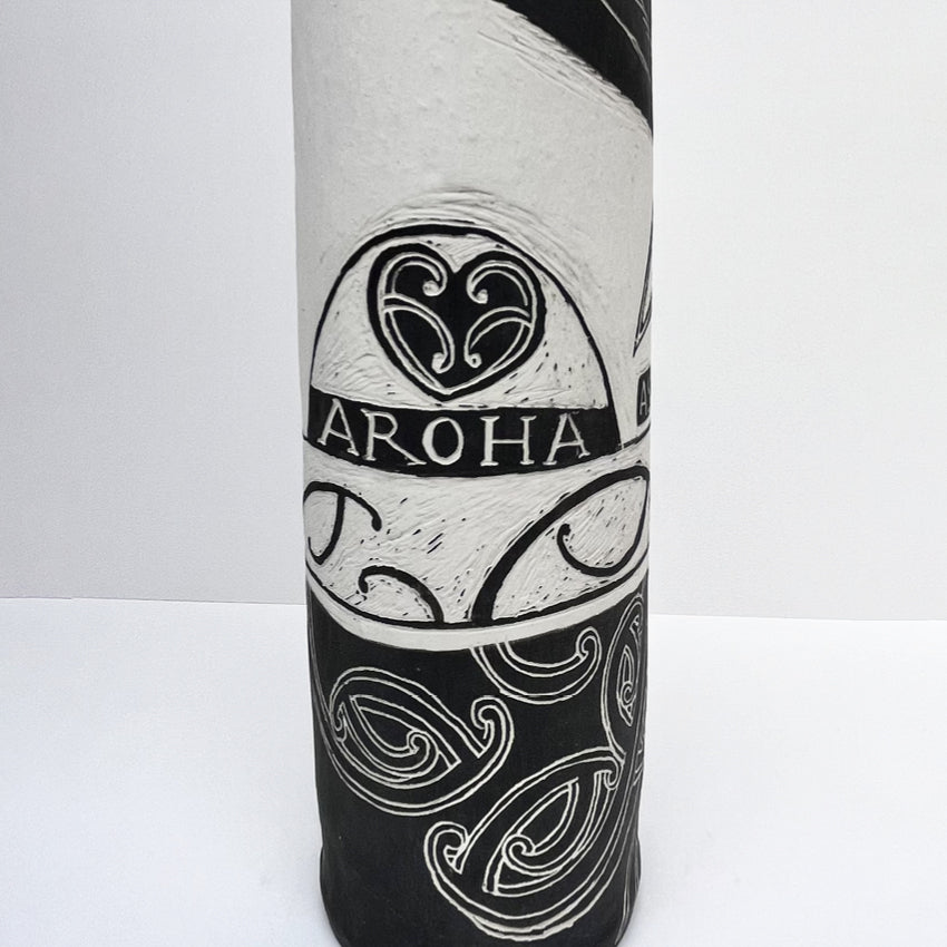 A close up of the Amber Smith Aroha Tall Vessel on a blank background