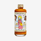 The Apostle Hot Sauce Spicy Mango, Turmeric and Ginger sauce on a blank background