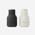The small Audo Salt and Pepper Grinders in Ash, Carbon and Beech on a blank background