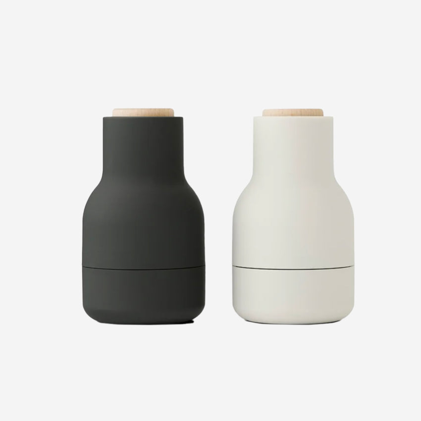 The small Audo Salt and Pepper Grinders in Ash, Carbon and Beech on a blank background