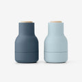 The Small Audo Salt and Pepper Grinder in Blues and Beech on a blank background