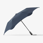The Blunt Metro Umbrella in Navy on a blank background