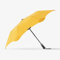 The Blunt Metro Umbrella in Yellow on a blank background