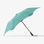 The Blunt Metro Umbrella in Mint on a blank background