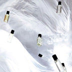 Multiple of the 15ml Bon Parfumeur Eau De Parfum bottles in a styled shot