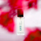 The Bon Parfumeur Eau de Parfum Woody 601 fragrance in a 15ml bottle with pink splotches