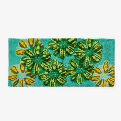 The Bonnie and Neil Candy Teal Bath Mat on a blank background