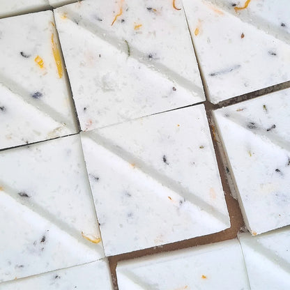 A closeup of the Botanical Ylang Ylang and Lavender Shower Steamers