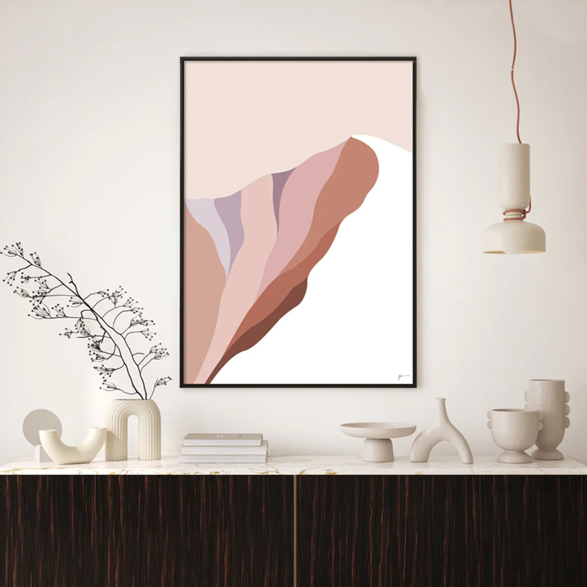 The Bridget Hall Modern Mountain Summit  2 Art Print in a black frame above a console