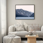 The Bridget Hall Designs Remarkables Twilight Print in a black frame above a couch