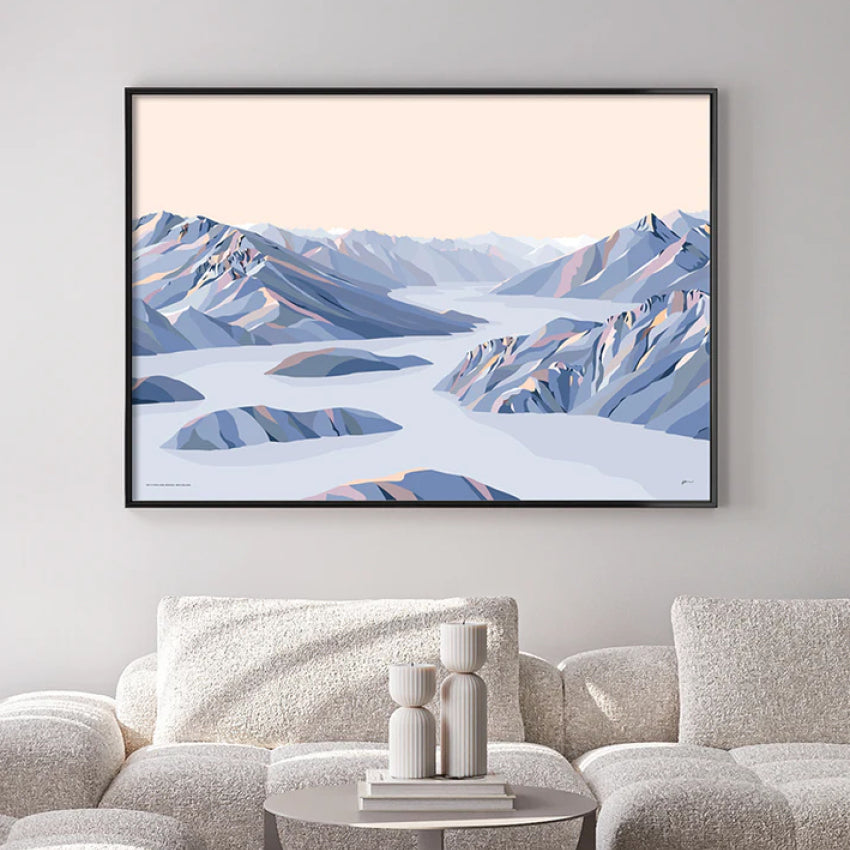 The Bridget Hall Designs Roys Peak Hike Print with No Boarder in a black frame above a couch