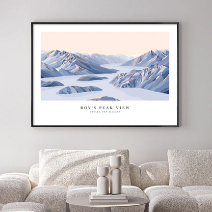 The Bridget Hall Designs Roys Peak View Art Print in a black frame above a couch