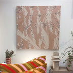 The Bridget Hall Design Original Black Peak Close Up Artwork hanging on a wall above cushions and vases