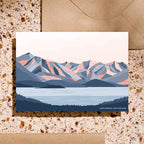 The Bridget Hall Lake Wanaka Mountains Gift Card on a terrazzo background with envelope