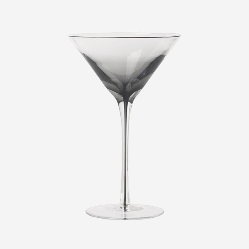 The Broste Copenhagen Martini Glass in Smoke on a blank background