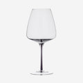 The Broste Copenhagen Red Wine Glass in Smoke on a blank background