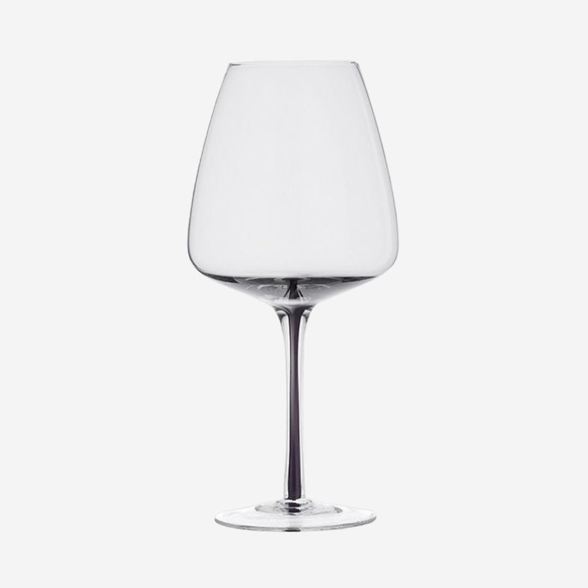 The Broste Copenhagen Red Wine Glass in Smoke on a blank background