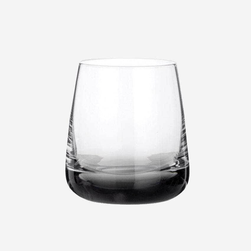 The Broste Copenhagen Short Tumbler Glass in Smoke on a blank background