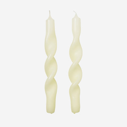 The Broste Copenhagen Twist Candles in Apricot Cream on a blank background