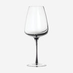 The Broste Copenhagen White Wine Glass in Smoke on a blank background