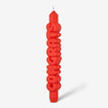 Candle Hand Congrats 3D Taper Candle in orange on a grey background