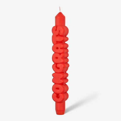 Candle Hand Congrats 3D Taper Candle in orange on a grey background